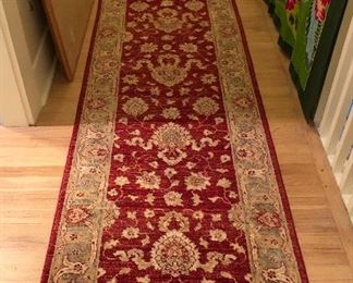 Oriental runner - 16 ft. long by 31.5” wide (darker areas are shadows) Also big bulletin boards & batik sarong on railing