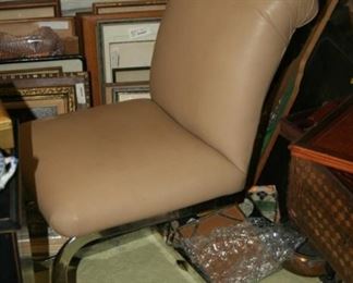 Vintage leather and chrome chairs - 4 available