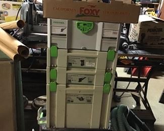 FESTOOL TOWER ON WHEELS IN EXCELLENT CONDITION INCLUDES TWO SANDERS, VACUUM , CIRCULAR SAW, BATTERY ASSIST DRILL, SAW GUIDE, BOX OF EXTRA SANDPAPER, 