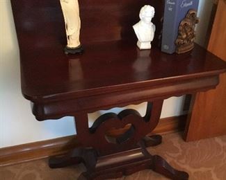 Mahogany tilt top table
Authentic oriental carved statue