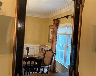 38. Regency Style Black and Bronze Beveled Mirror w/ Swag Detail (31" x 46")