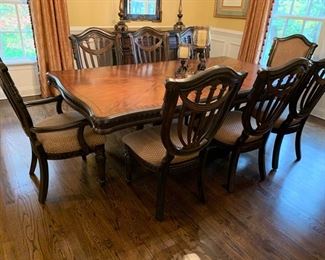 36.  Fairmont Designs Dining Table (140" x 47" x 31") w/ 1-18" Leaf; 2 Upholstered Arm Chairs w/ Carved Wood Frame (24" x 19" x 42"); 6 Side Chairs w/ Shield Back and Upholstered Seats (21" x19" x 42")