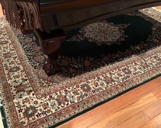 104. Oriental Wool Rug w/ Navy Background and Floral Design (6' x 9')