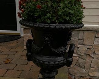 135. A Pair of Cast Iron Black Urn Planters