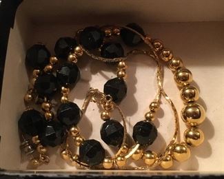 Gold and black necklace