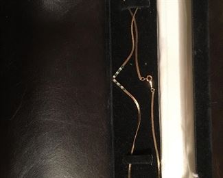 Beautiful gold chain with “bling”