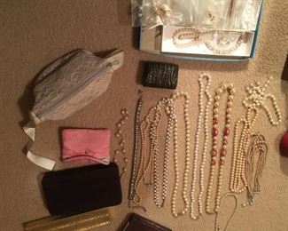Large assortment of pearl necklaces