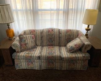 Beautiful floral sofa, unique and tables and table lamps