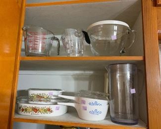 Pampered chef mixing bow, Pyrex mixing bowl, and corning cookware.