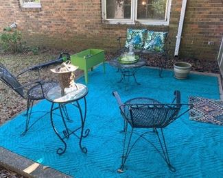 Outdoor set with settee, two chairs, and coffee table