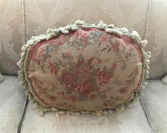One of a large collection of needlepoint pillows
