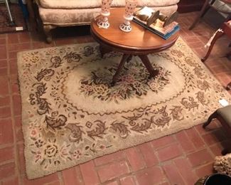 One of several hooked rugs