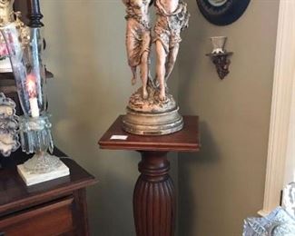 Lorage (the storm) statue by Emile Bruchon atop an antique pedestal