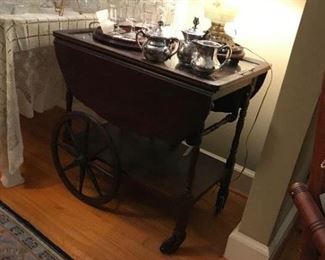 Mahogany tea cart with glass serving tray