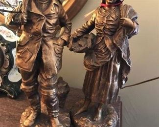 Old gold-toned statues