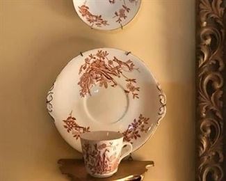 Note gold ornate sconces in transfer ware grouping