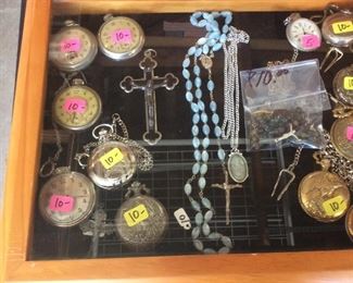 Pocket watches, religious crosses