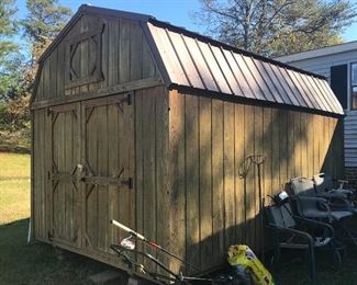 Wooden shed with loft shelving 10' X 14'