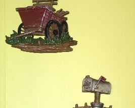 Various vintage wall decor by Sexton