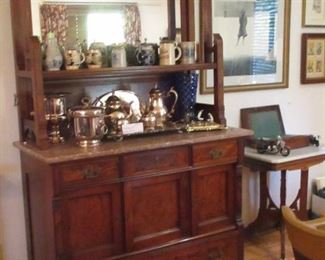beer stein collection atop Matthew Bros.(?) sideboard