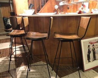 Four vintage bar stools 