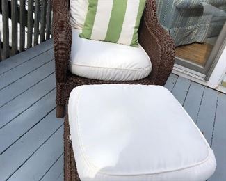 2 Pottery Barn all weather chairs with ottomans and cushions.