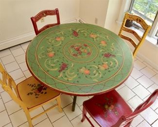 Top view of hand painted table with 4 chairs