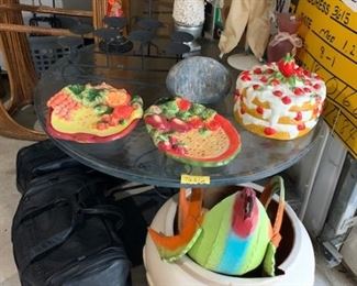 Festive plates and chicken tire hanging plant holder