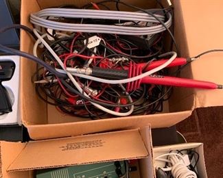 many electronics parts and test leads
