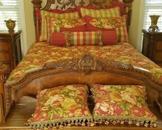 Gorgeous carved queen bed.