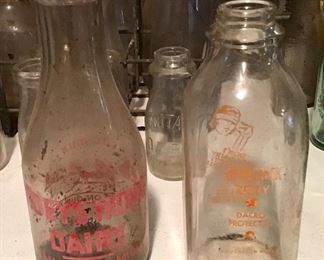 A couple of Dairy bottles