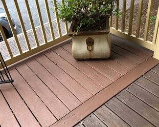 Tons of pretty planters in the front yard and in the courtyard