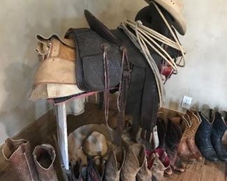 Western saddle and cowboy boots 