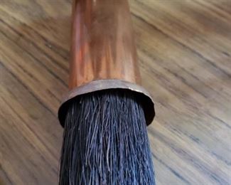 Copper retractable sweep thing...or whatever you want to use it for.  None of my business.  You live your life, I live mine.  Even though my mother would tell you otherwise.  Uggghhh..Can you say CONTROL FREAK?  Shhhhh!  She will be there.