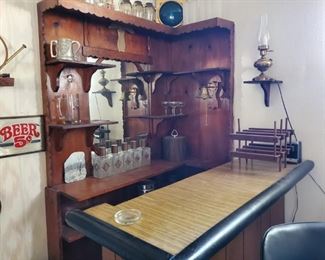 Three Piece Bar!  I would kill to have this in my house, but since my neighbors never leave anyway, it's probably a curse.