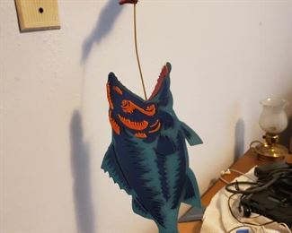 Here, fishy fishy.  Mom does that to her cat.  Yeah, that's gonna get him inside.  Nutjob..love her