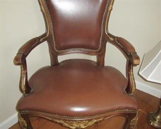 LEATHER AND GOLD TRIM CHAIR