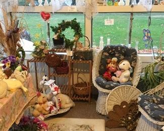 Lots of artificial flowers, wreaths, pottery