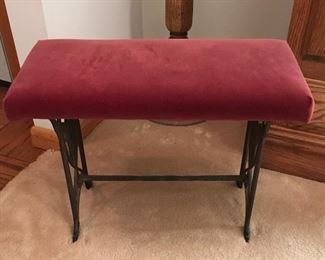 RED CUSHIONED BENCH.