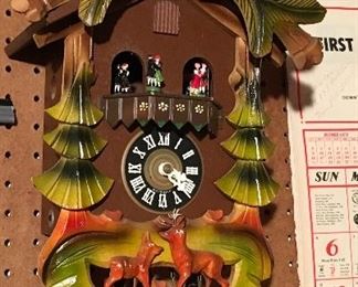 MULTICOLOR PAINTED VINTAGE CUCKOO CLOCK.