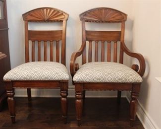 Six Haverty's chairs sold with table - four on left and two host chairs on right