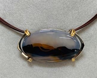 Montana jasper in sterling silver and 14kt gold pendant/brooch.