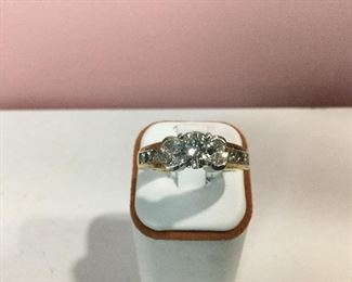 Yellow and white gold diamond ring