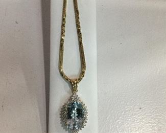 Yellow gold aquamarine and diamond necklace
