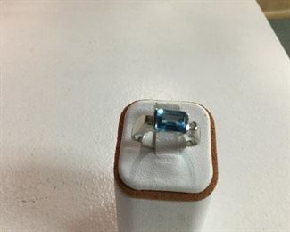 White gold blue topaz ring