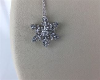 White gold and diamond snowflake necklace