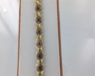 Yellow gold ruby and diamond bracelet