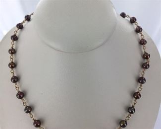 Yellow gold and chocolate pearl necklace