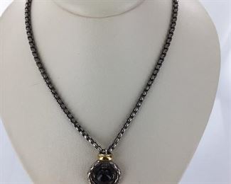 Silver, yellow gold and onyx necklace