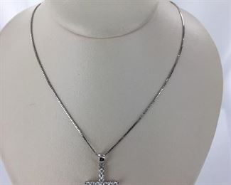 White gold and diamond cross necklace